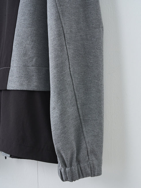 【TRANSITION】ポンチ×ストレッチナイロン切り替えフーデッドブルゾン